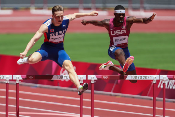 Norway’s Karsten Warholm in Puma, and American Rai Benjamin in Nike.