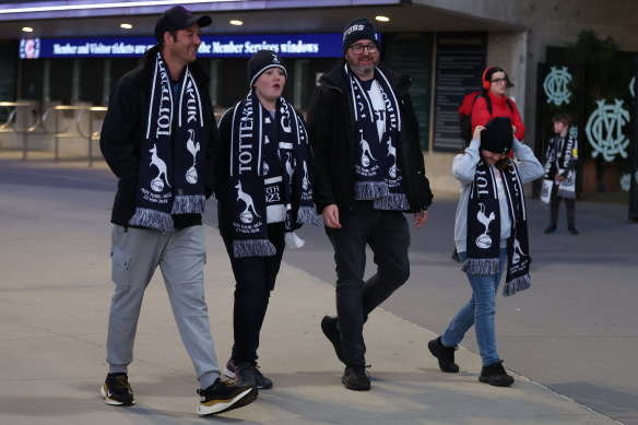 Tottenham Hotspur fans walk into the MCG.