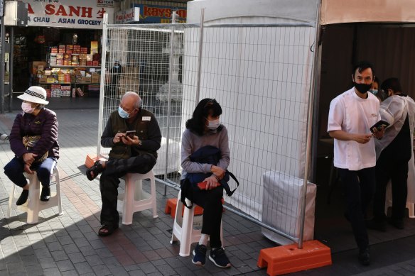 Cabramatta pharmacist Quin On runs two pharmacies, both offering walk-in AstraZeneca vaccine shots. 