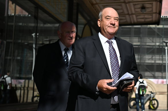 Daryl Maguire (right) arrives at Downing Centre Local Court on Monday.