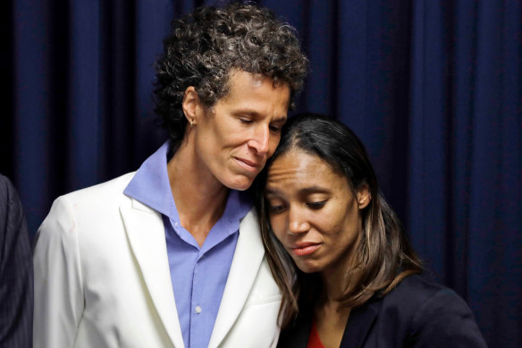 Bill Cosby accuser Andrea Constand, left, embraces prosecutor Kristen Feden during a news conference after Cosby was found guilty in his sexual assault retrial in 2018. 