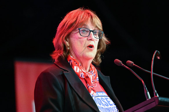 Lisa Fitzpatrick, the Victorian branch secretary of the Australian Nurses and Midwifery Federation, speaks at Festival Hall.