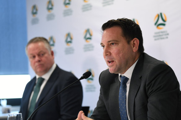 FFA CEO James Johnson, right, speaks to media at a Sydney conference.
