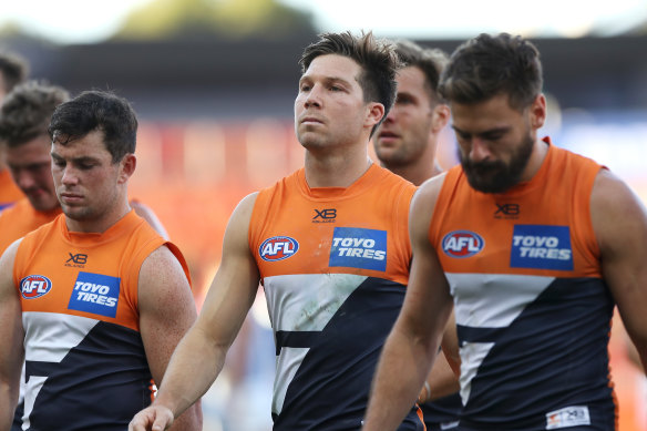 Toby Greene, centre, has been sidelined for round three. 