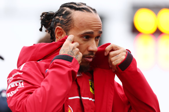 Lewis Hamilton braces himself for the wind and rain in Melbourne.