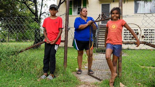 Melanie McGrady with her daughter Taqueesha Williams and nephew Zachary McIntosh outside their Boggabilla home. 