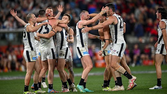 The Blues celebrate on the final siren.