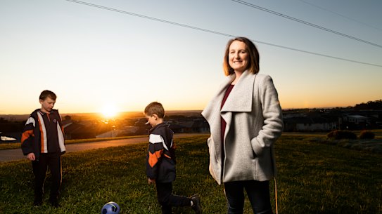 Kate Laney and her sons Lucas  and Nathan, who attend Gledswood Hills primary school. Laney moved to Gregory Hills on the assumption a new school would be built there.