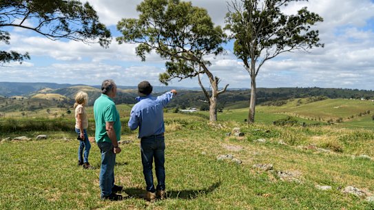 Propety owners Christine and Peter Rose, with Mal Brierley, are fighting Transgrid’s proposed route for the new power lines.