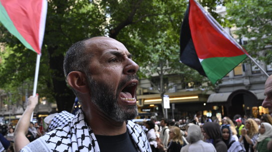Pro-Palestine protestors congregated to support a Melbourne City Council motion for a ceasefire in Gaza.