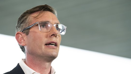 NSW Premier Dominic Perrottet has committed to a mandatory cashless gaming card.