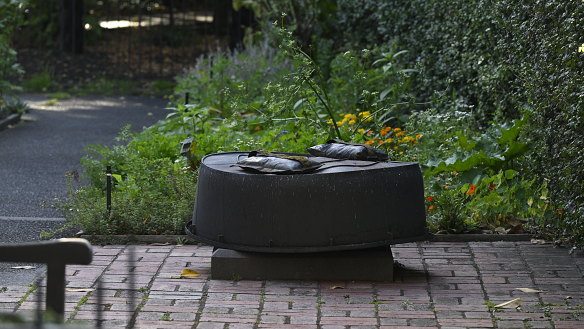 The plinth that once held a statue of Captain James Cook in Fitzroy Gardens.