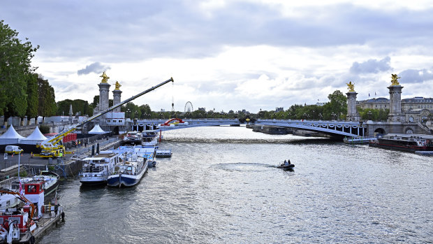 Seine me up: French president vows to swim in Paris river despite Olympic concerns