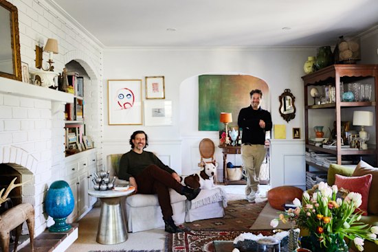“This home is a ’70s split-level that’s confused whether it’s American colonial or Mediterranean Spanish – a perfect canvas,” says Steven Maccora (standing).