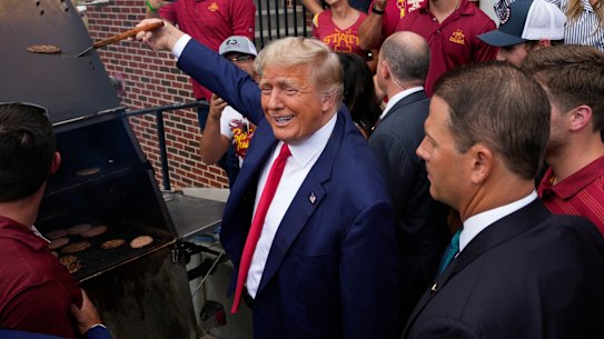 Donald Trump, seen cooking a hamburger, is a champion of the US cattle industry.