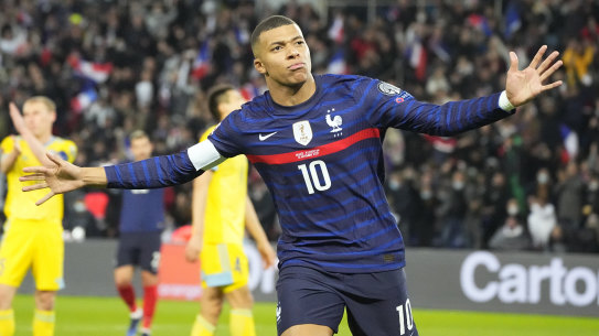 Kylian Mbappe celebrates scoring France’s third goal.