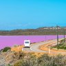 Scenic drive along the coast of bubblegum-hued lake, Hutt Lagoon.