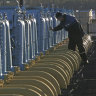 A Belarusian worker on duty at a gas compressor station 130 km southwest of the capital Minsk. Officials in Poland and Bulgaria say Russia is suspending their countries’ natural gas deliveries starting on Wednesday.
