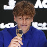 Jannik Sinner drinks a glass champagne after defeating Alexander Zverev in the men’s singles final.