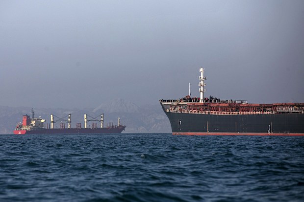 Ships remain anchored on May 16, 2026 in in the Strait of Hormuz near Larak Island, Iran. 