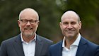 CyberCX chief strategy officer Alastair MacGibbon and CEO John Paitaridis.