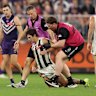 Collingwood’s Lachie Schultz stumbles leaving the field in the round nine match against Fremantle.