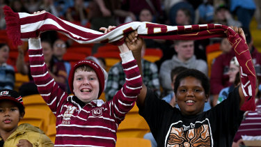 BRISBANE, AUSTRALIA - MAY 16: Queensland fans show their support during game one of the 2024 Women’s State of Origin series between Queensland and New South Wales at Suncorp Stadium on May 16, 2024 in Brisbane, Australia. (Photo by Bradley Kanaris/Getty Images)