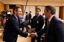 Matt Comyn greets Jim Chalmers at the investor roundtable in Canberra on November 22, 2024.