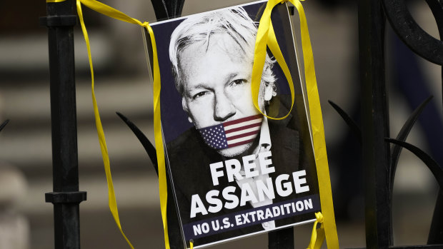 Unwell Julian Assange briefly attends court as US presses for extradition