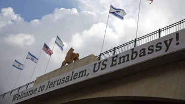 A sign on a bridge leading to the US Embassy ahead of Monday's official opening in Jerusalem.
