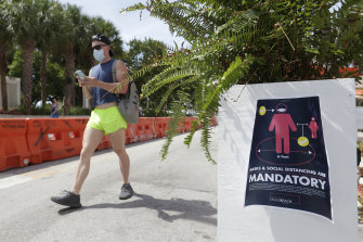 Coronavirus health warnings along Ocean Drive on Miami's South Beach.