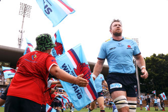 Jed Holloway leading out the Waratahs as a stand-in captain.