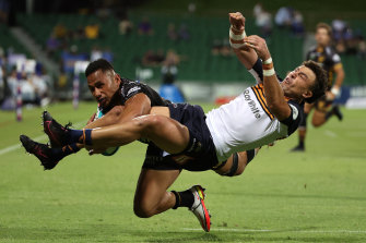 Toni Pulu of the Force collides with Tom Banks of the Brumbies.