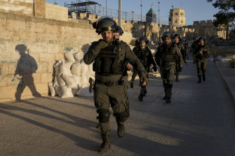 Israeli security forces gather at the Al-Aqsa Mosque compound in Jerusalem’s Old City on Friday.