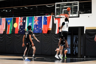 Ariel Hukporti goes up for the ball at Melbourne United training.