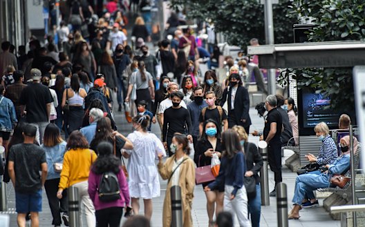 A new normal: Crowds are slowly returning to the CBD.