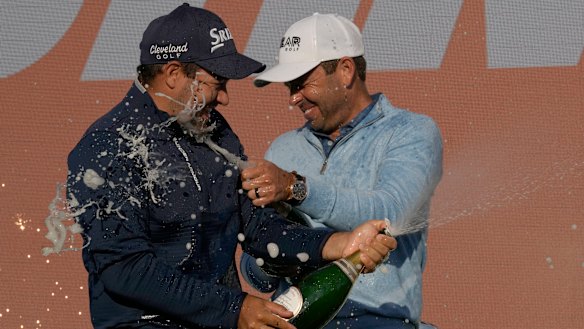Hennie Du Plessis and Charl Schwartzel celebrate after their Stinger team took out the teams event.