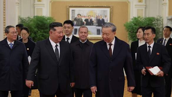 North Korean leader Kim Jong-un (centre left) greets Chinese Premier Li Qiang (left), Vietnamese Communist Party General Secretary To Lam (centre right) and Russian Security Council Deputy Chairman Dmitry Medvedev (centre) in Pyongyang.