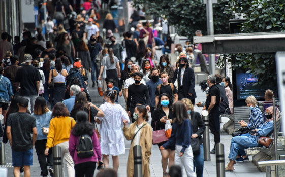 A new normal: Crowds are slowly returning to the CBD.