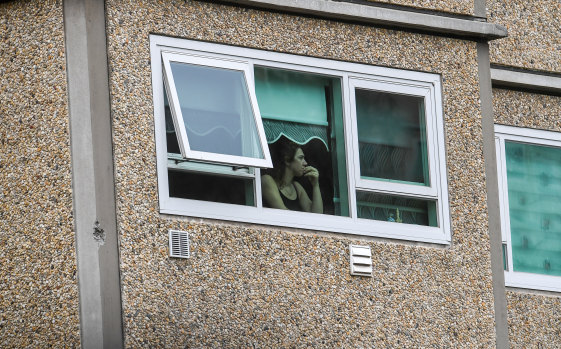 A resident stuck in their flat at a locked down tower in Flemington.