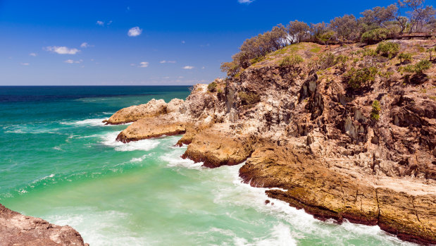 Police are searching for a man who was swimming from Redland Bay to North Stradbroke Island.