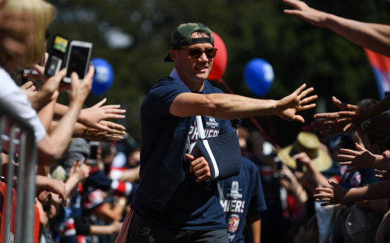 Hero's reception: Cooper Cronk greets Roosters fans at Allianz Stadium on Monday.