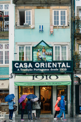 Storefronts in the city of Porto, Portugal. Hotels, restaurants and shops have opened in droves, fuelled by a tourism surge.
