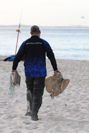 Adam Maddalena, pictured, and angling partner Glenn Lambert have caught about 150 bullsharks in the past five years, which they tag and release. It's also good sport, they say. 