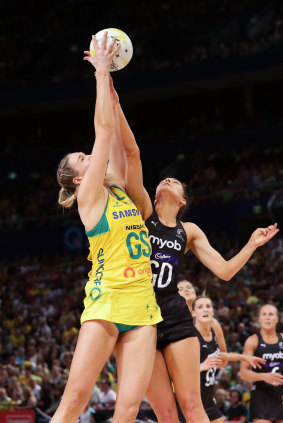 Caitlin Bassett of Australia is challenged by Karin Burger of New Zealand during the 2019 series.
