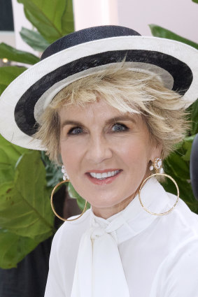 Julie Bishop jumps on the 'frostume' trend in Christie Nicolaides earrings on Derby Day.