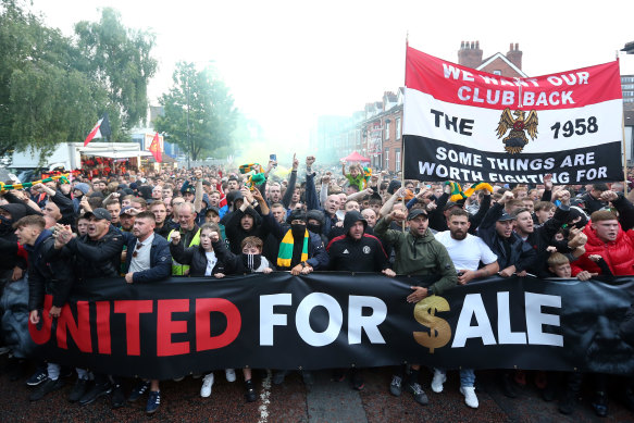 Manchester United fans protest against the club’s owners before the match against Liverpool.