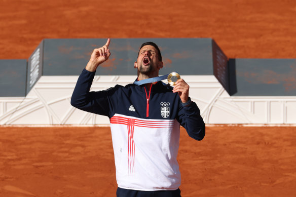 Djokovic celebrates his gold medal in Paris.