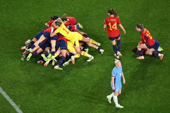 Spain’s players celebrate beating England in the final.