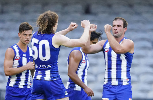 Two goals by Ben Cunnington (right) were like gold for the Roos as they came from the clouds to edge St Kilda.